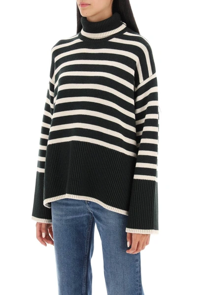 Shop Totême Toteme Striped Wool And Cotton Turtleneck Sweater In Multicolor