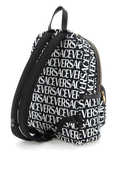 Shop Versace All-over Logo Backpack In Multicolor