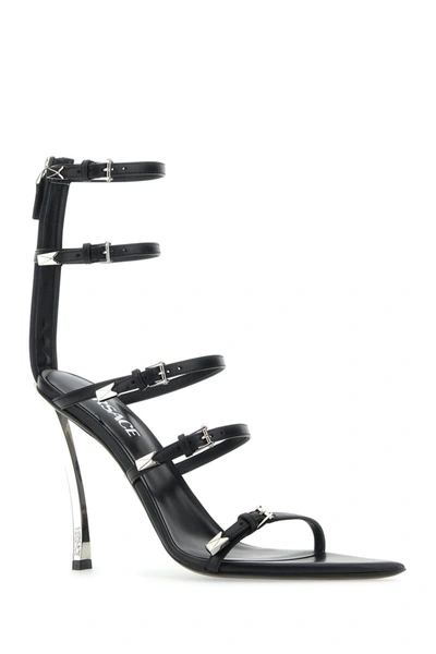 Shop Versace Sandals In Blackpalladium