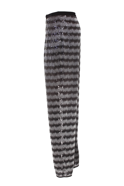 Shop Emporio Armani Chevron Motif Trousers In Grigio