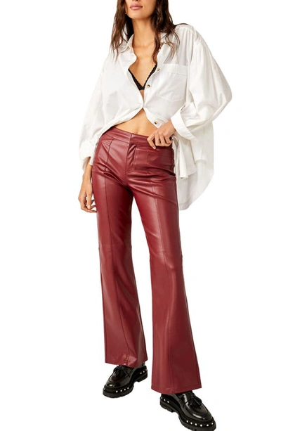 Shop Free People Uptown High Waist Faux Leather Flare Pants In Mulberries
