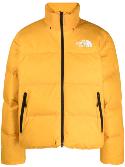 Shop The North Face Yellow Rmst Nuptse Quilted Jacket In Orange