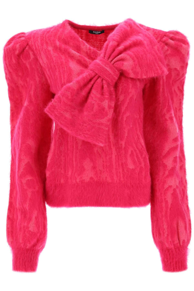 Shop Balmain Moiré-effect Sweater With Maxi Bow In Fuchsia
