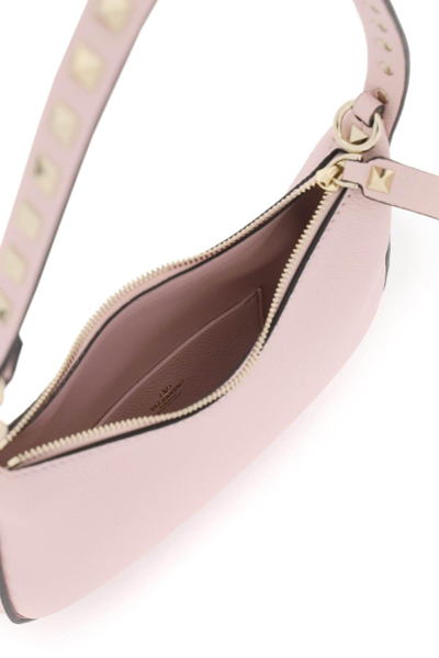 Shop Valentino Rockstud Mini Hobo Bag In Pink