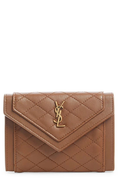 Shop Saint Laurent Small Gaby Quilted Leather Envelope Wallet In Ginger Brown