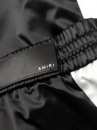 Shop Amiri Hawaiian Print Track Pants In Black