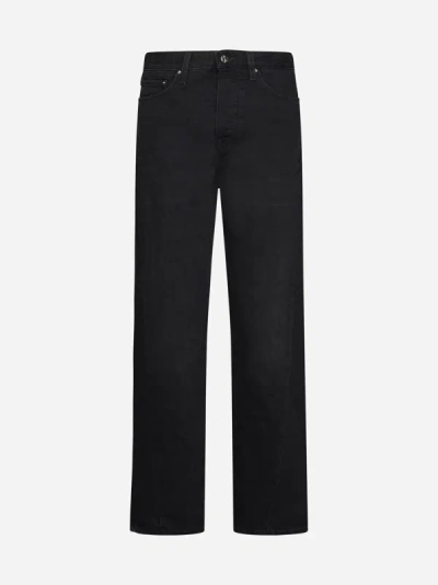 Shop Totême Twisted Seam Jeans In Faded Black