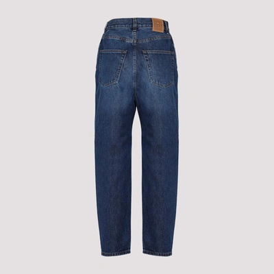 Shop Totême Tapered Jeans In Blue