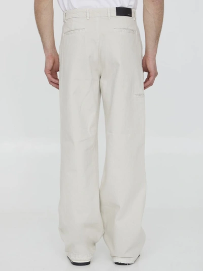 Shop Amiri Cream-colored Denim Jeans In White