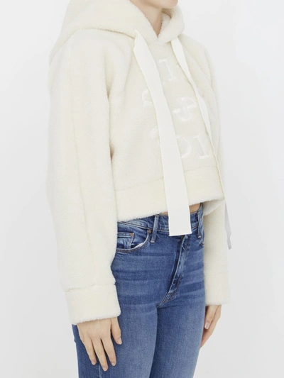 Shop Patou Cropped Medallion Logo Hoodie In Ivory
