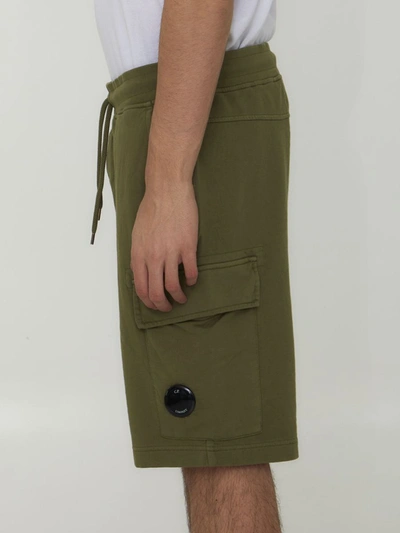 Shop C.p. Company Cotton Fleece Bermuda Shorts In Green