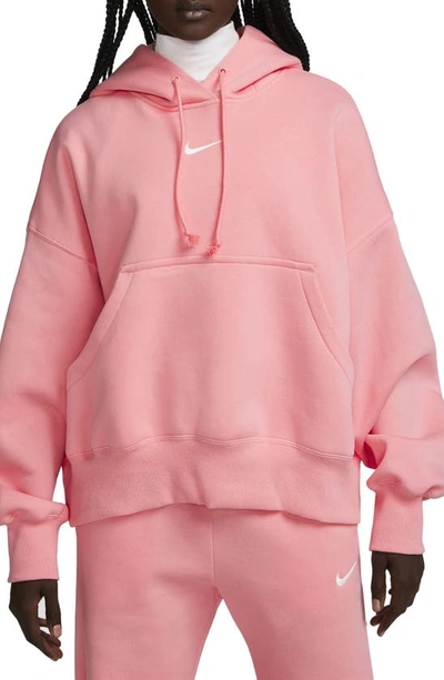 Shop Nike Sportswear Phoenix Fleece Pullover Hoodie In Coral Chalk/ Sail
