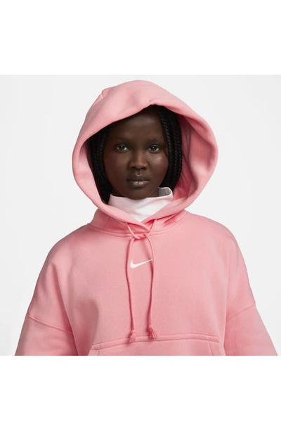 Shop Nike Sportswear Phoenix Fleece Pullover Hoodie In Coral Chalk/ Sail