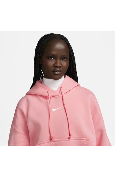 Shop Nike Sportswear Phoenix Fleece Pullover Hoodie In Coral Chalk/ Sail