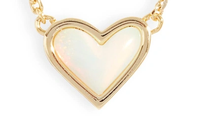 Shop Kendra Scott Ari Heart Pendant Necklace In Gold White Opalescent