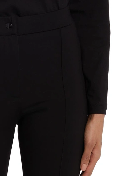 Shop Moncler Skinny Ankle Trousers In Black