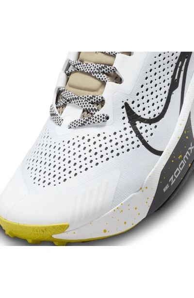 Shop Nike Zoomx Zegama Trail Running Shoe In White/ Vivid Sulfur/ Black
