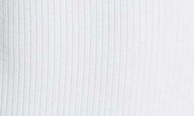 Shop Guess Karlee Jewel Button Rib Bodysuit In White