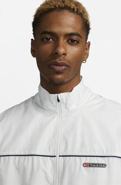 Shop Nike Storm-fit Track Club Woven Running Jacket In Summit White/ Midnight Navy