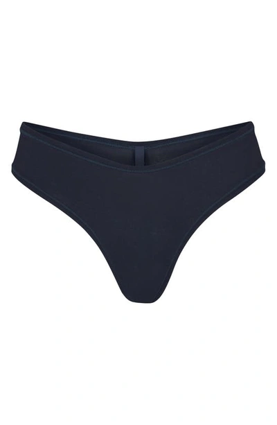 Shop Skims Cotton Jersey Dipped Thong In Navy