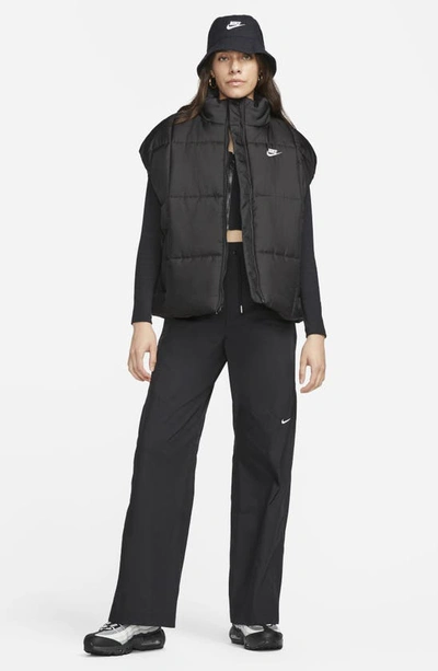 Shop Nike Sportswear Classic Water Repellent Therma-fit Loose Puffer Vest In Black/ White