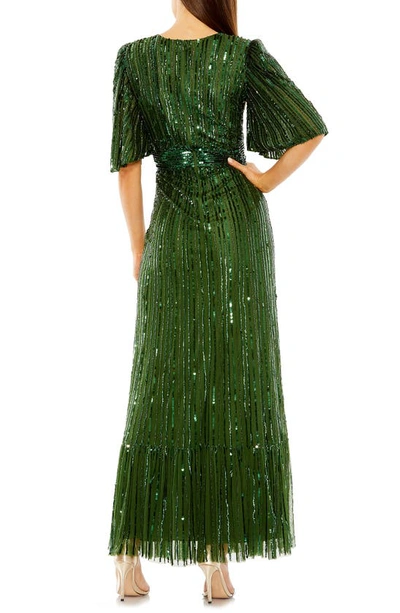 Shop Mac Duggal Sequin Flutter Sleeve Gown In Emerald