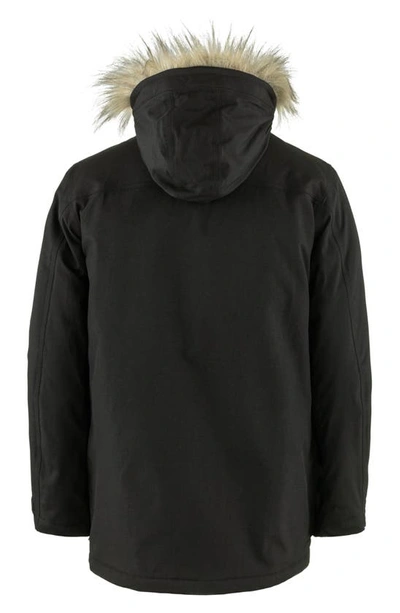 Shop Fjall Raven Nuuk Lite Waterproof Parka With Faux Fur Trim In Black