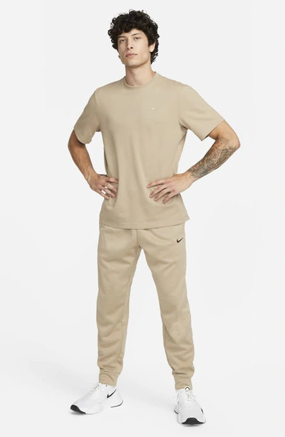Shop Nike Primary Training Dri-fit Short Sleeve T-shirt In Khaki/ Khaki