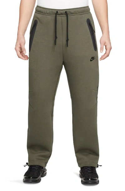 Shop Nike Tech Fleece Open Hem Pants In Medium Olive/ Black