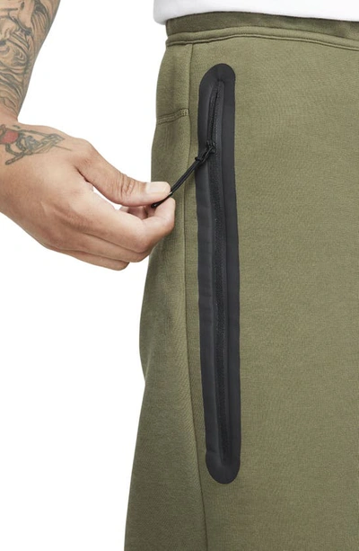 Shop Nike Tech Fleece Sweat Shorts In Medium Olive/ Black