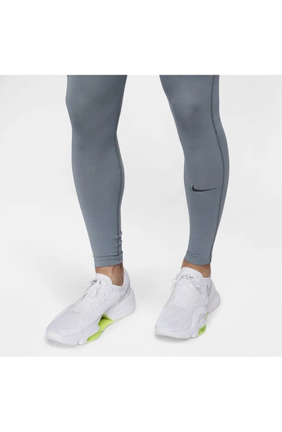 Shop Nike Pro Warm Dri-fit Tights In Smoke Grey/ Black