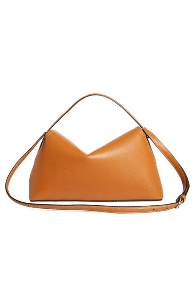 Shop Totême T-lock Curved Leather Shoulder Bag In Tan Grain