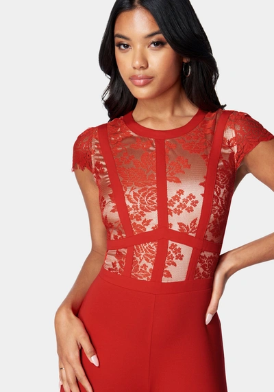 Shop Bebe Caged Lace Catsuit In Red