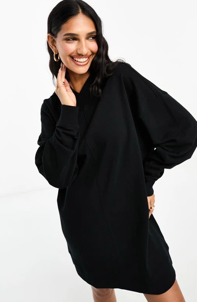 Shop Asos Design Long Sleeve Sweatshirt Dress In Black