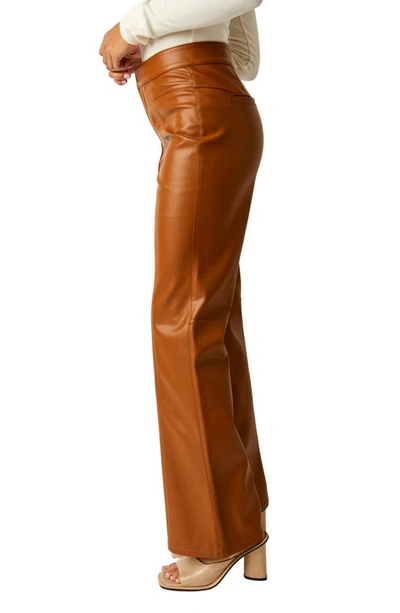 Shop Free People Uptown High Waist Faux Leather Flare Pants In Brown