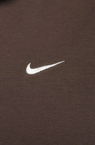 Shop Nike Essentials Stretch Crop Polo In Baroque Brown/ Sail