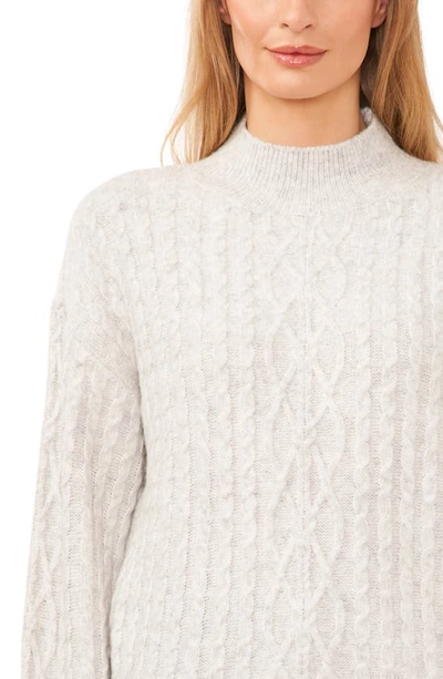 Shop Cece Mock Neck Cable Stitch Sweater In Silver Heather