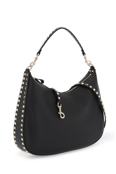 Shop Valentino Garavani Grained Leather 'rockstud' Hobo Bag Women In Black