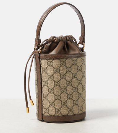 Shop Gucci Ophidia Gg Mini Canvas Bucket Bag In Brown