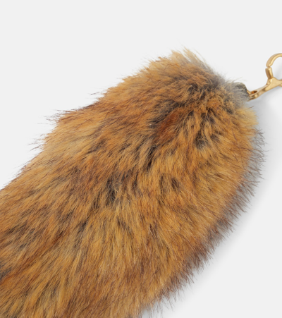 Shop Burberry Faux-fur Bag Charm In Brown