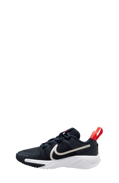 Shop Nike Kids' Star Runner 4 Sneaker In Obsidian/ Phantom/ Crimson