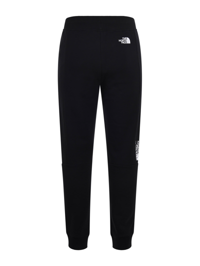 The North Face Jogging Pants With Logo In Nero