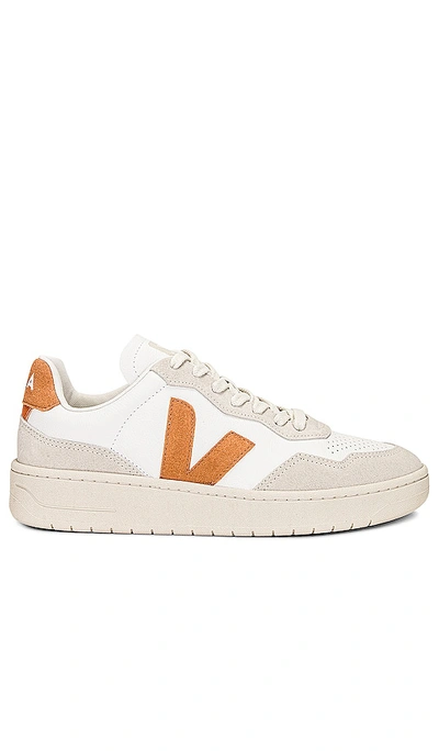 Shop Veja V-90 Sneaker In White