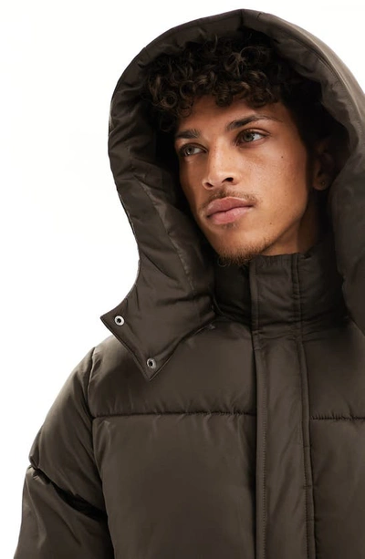 Shop Asos Design Water Resistant Puffer Jacket With Removable Hood In Brown