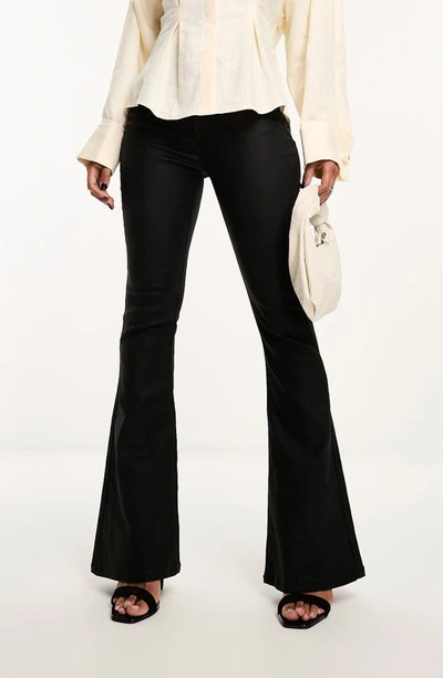 Shop Asos Design Coated Stretch Sculpting Flare Jeans In Black