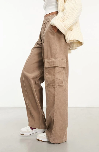 Shop Asos Design Cotton Corduroy Pull-on Cargo Pants In Brown