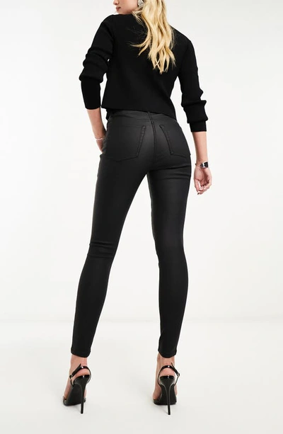 Shop Asos Design Coated Skinny Jeans In Black