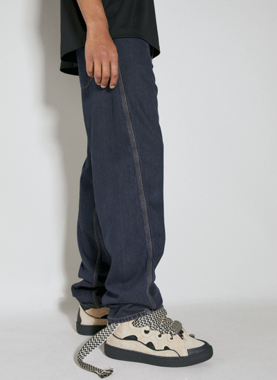Shop Lanvin Baggy Twisted Leg Jeans In Brown