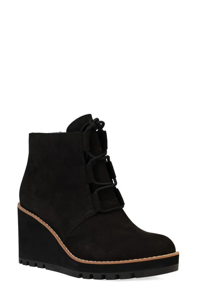 Shop Eileen Fisher Alpine Genuine Shearling Wedge Bootie In Black