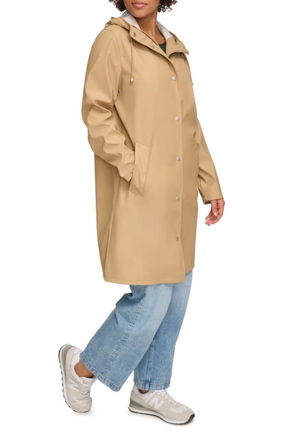 Shop Levi's Water Resistant Hooded Long Rain Jacket In Tan